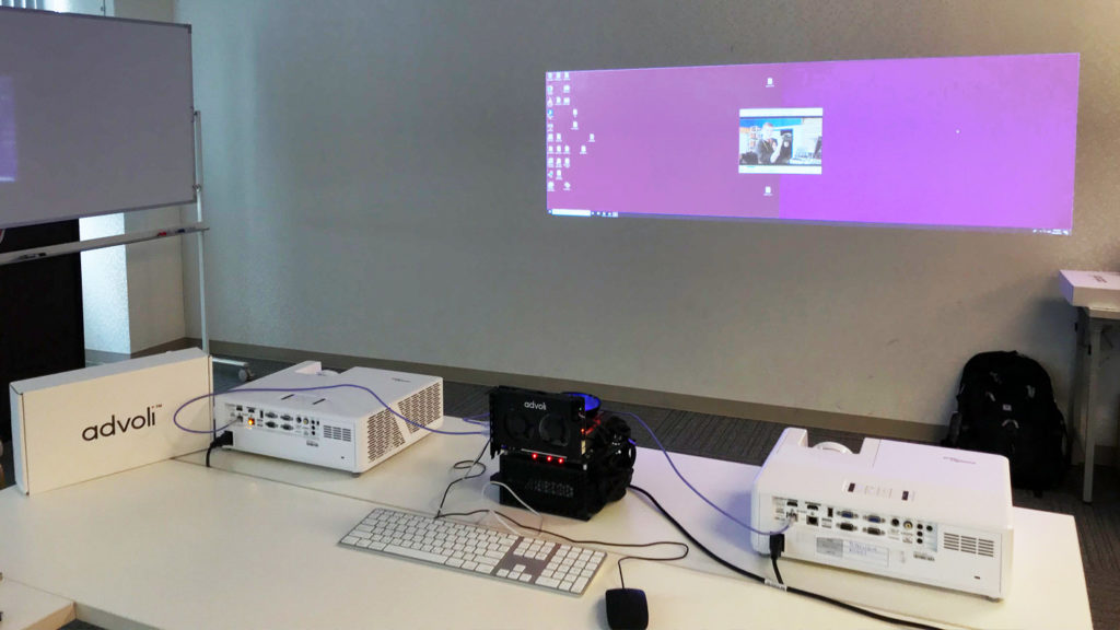 Having fun making eyefinity group across two Optoma projectors using advoli TB4 Standard at the HDBaseT Plugfest 2019